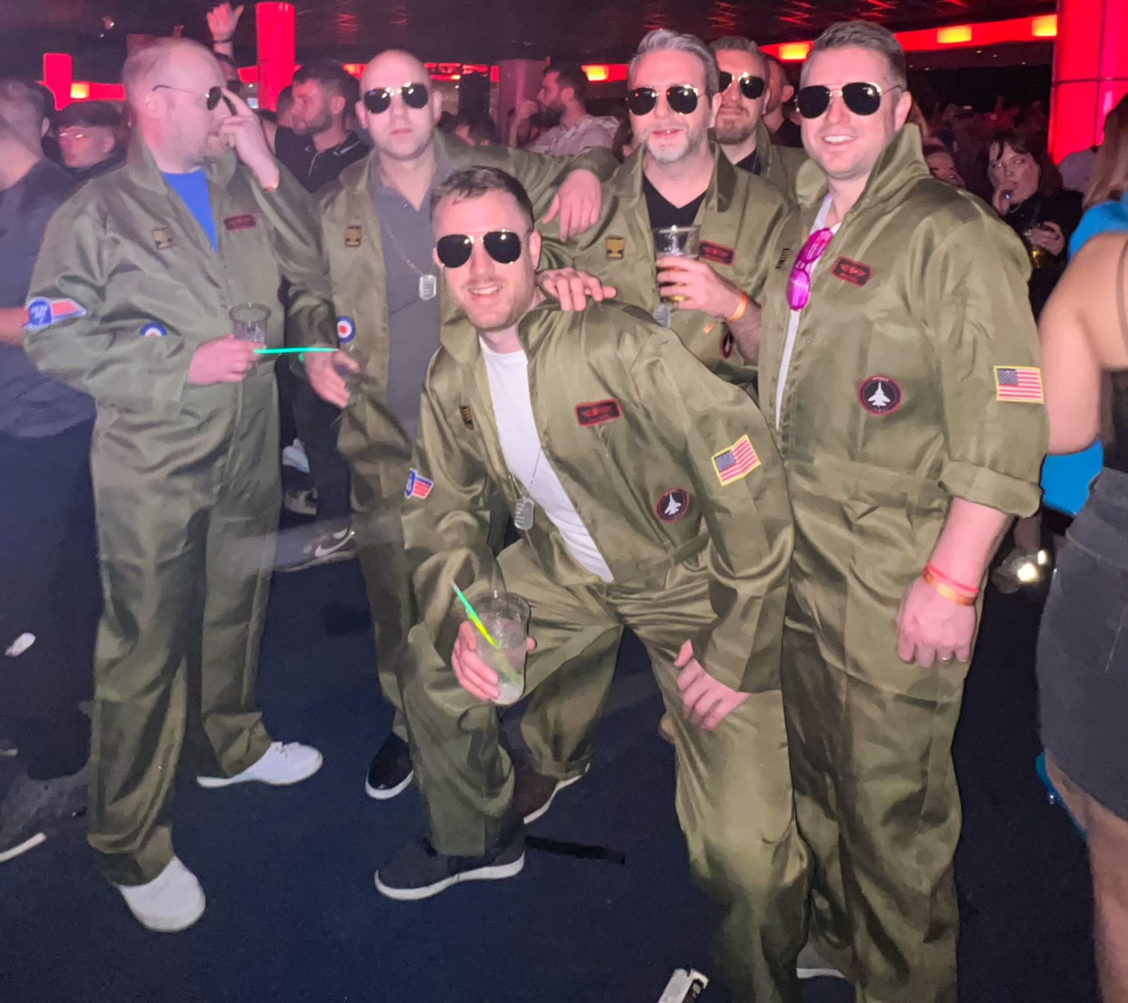 CruisingBears guys in matching flight suits for a theme party