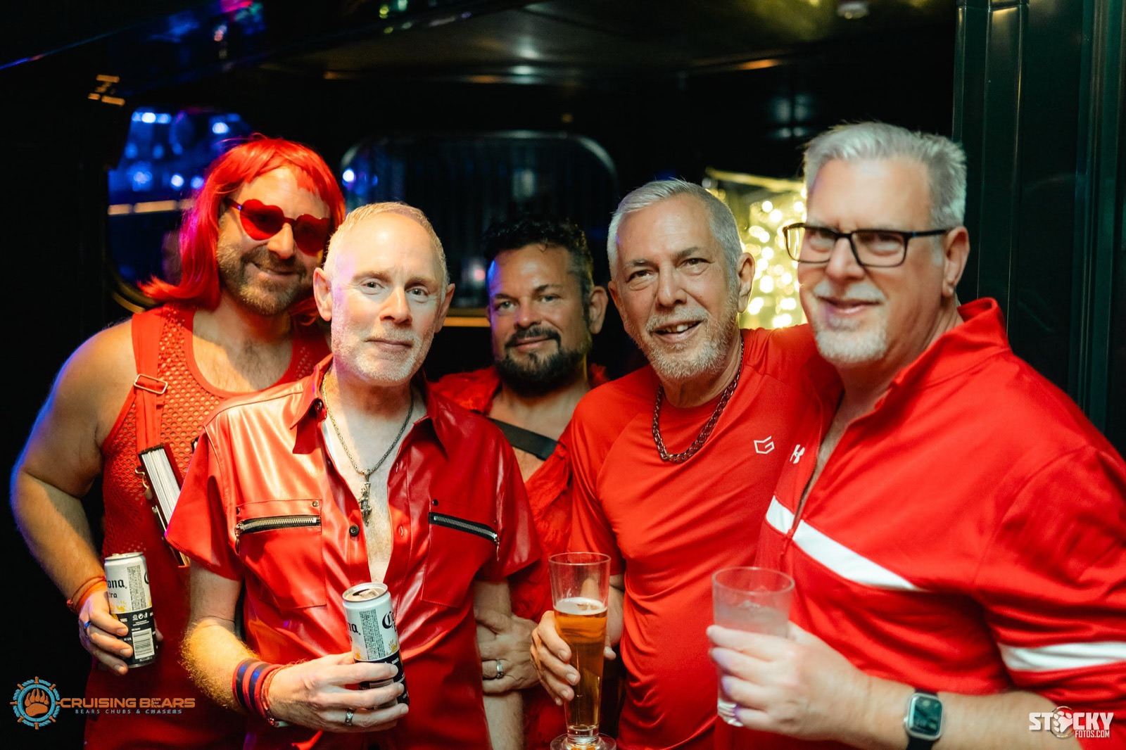 Friends dressed in red for a themed night party