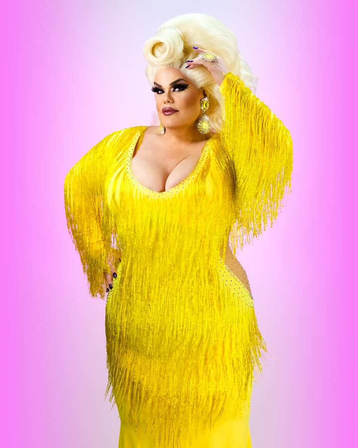 Darienne Lake in a yellow fringe gown