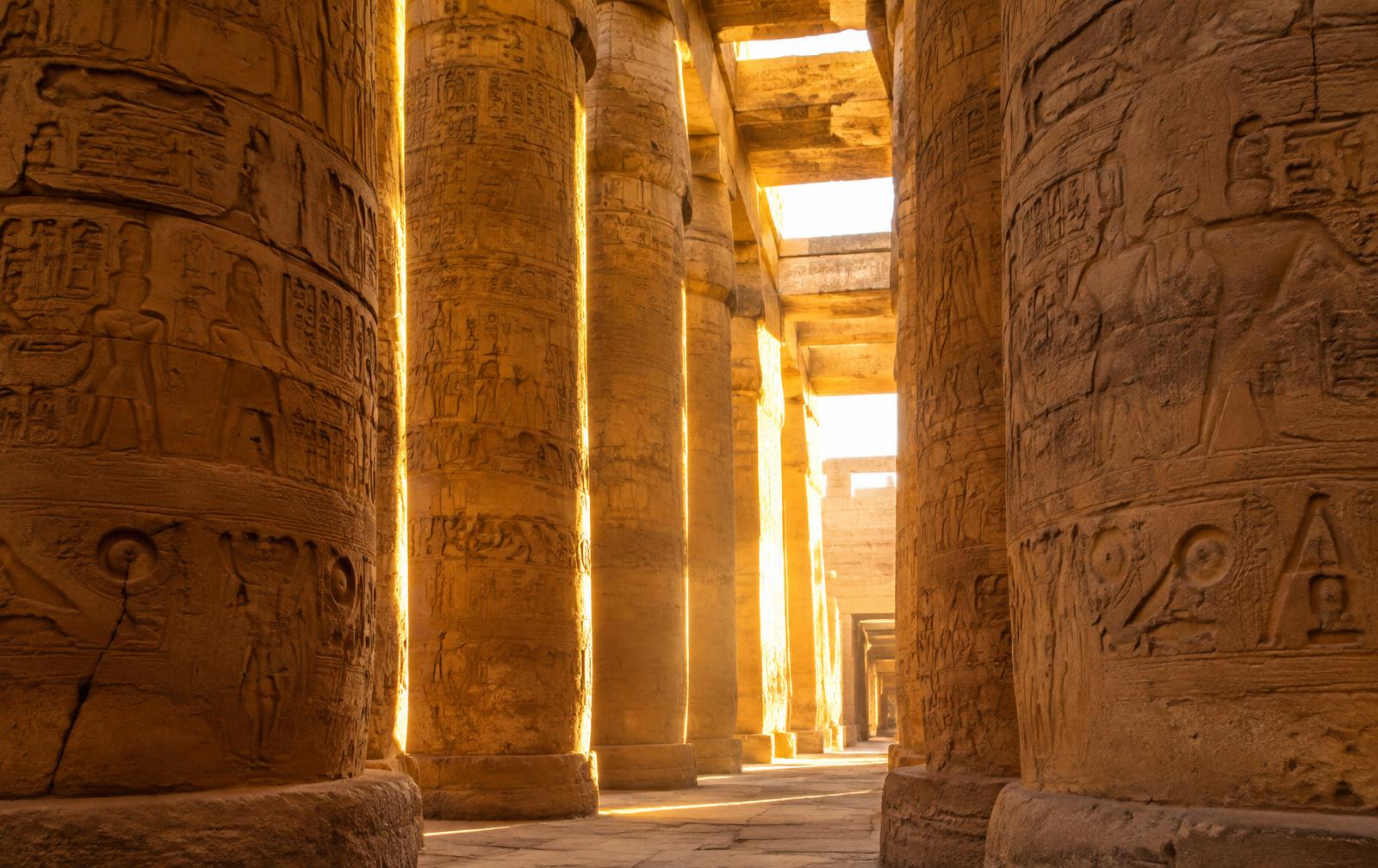Sunlight between the giant columns of Karnak Temple