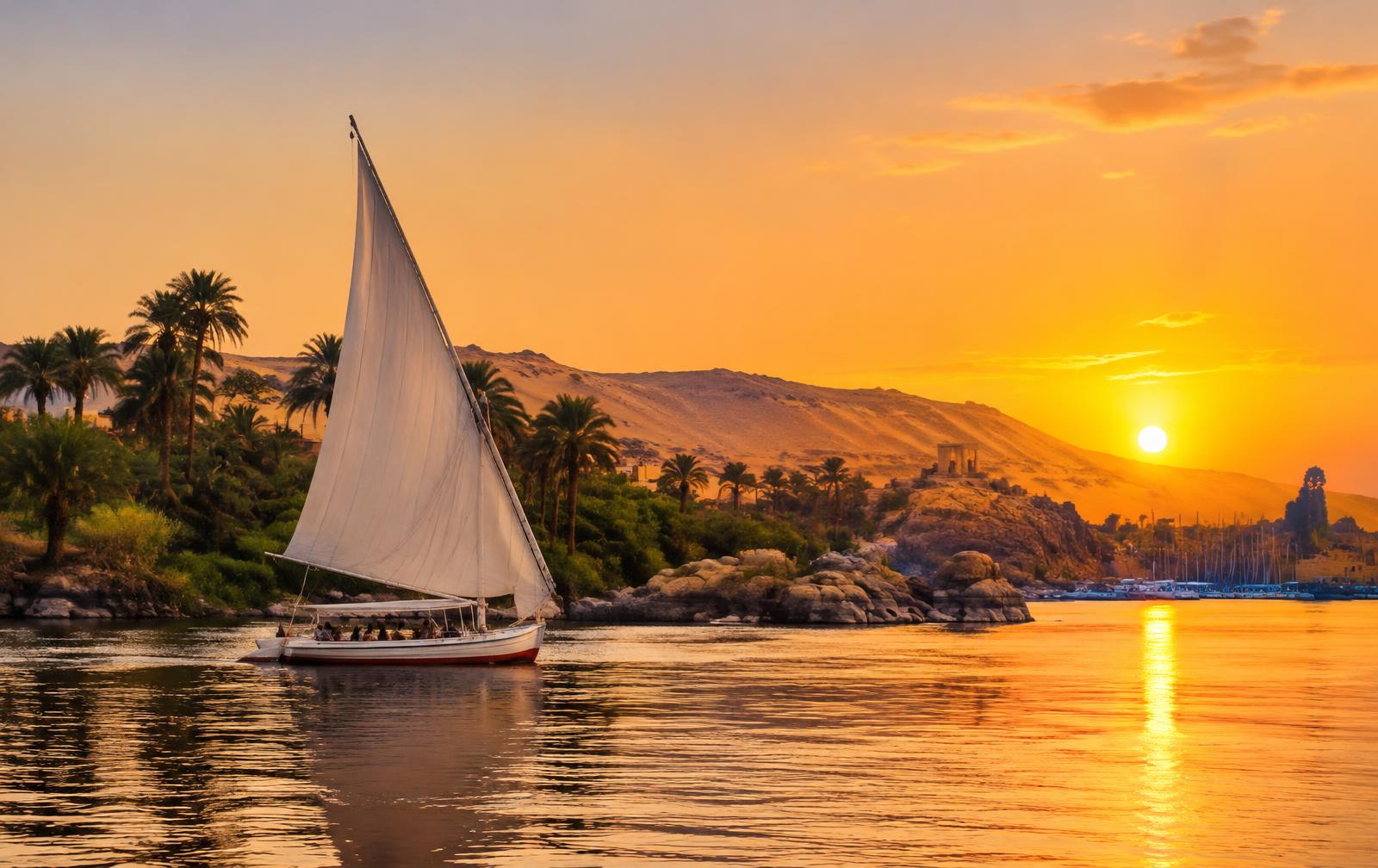 A felucca sailing the Nile at Aswan at sunset