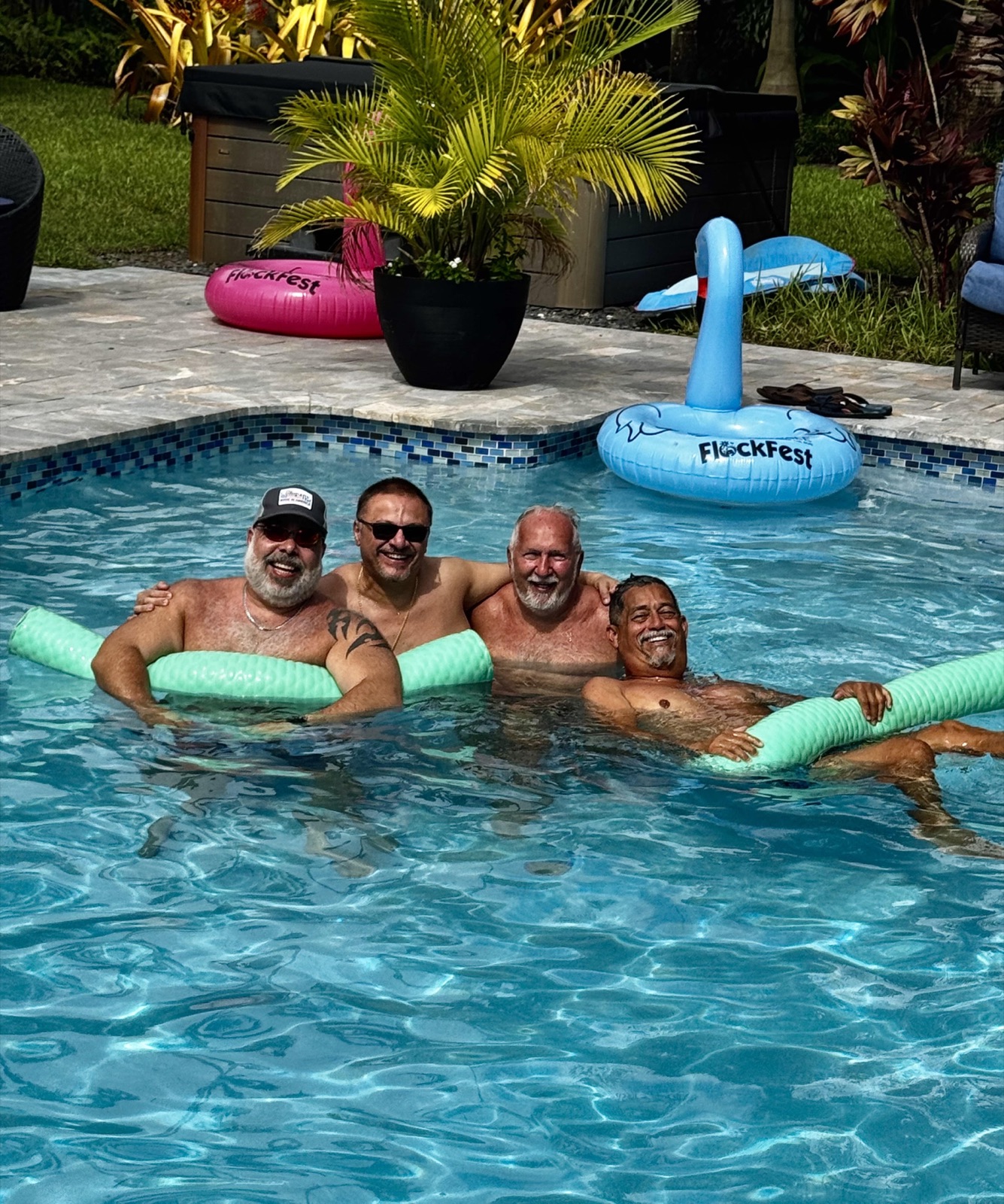 Crew relaxing together in the pool at the Solstice Wilton Manors meet & greet