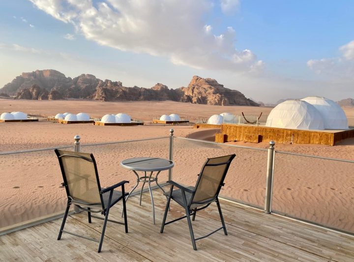 Domes of the Wadi Rum UFO Luxotel beneath the desert mountains